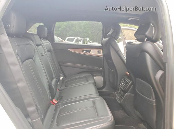 2LMPJ7JP0GBL44159 2016 LINCOLN MKX White Vista interior trasera