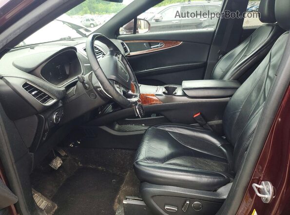 2LMPJ8K91KBL56402 2019 LINCOLN NAUTILUS Maroon Vista interior delantera