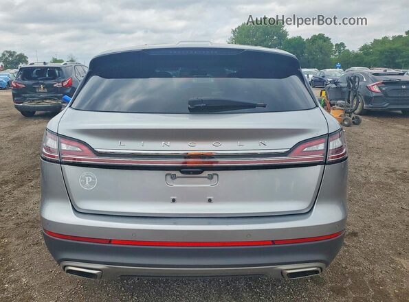 2LMPJ8K93NBL09554 2022 LINCOLN NAUTILUS Серебряный Вид сзади