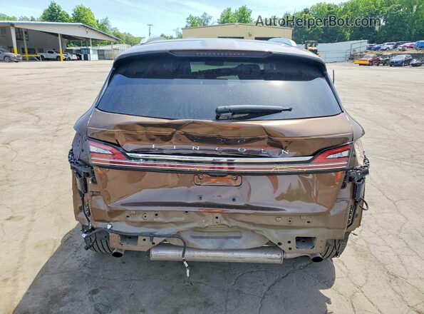 2LMPJ8K97NBL08200 2022 LINCOLN NAUTILUS Brown Rear view