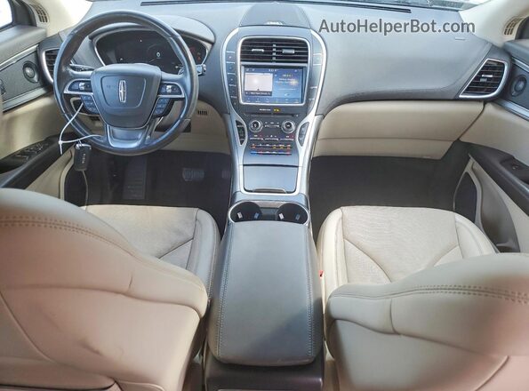 2LMPJ8KP9LBL13099 2020 LINCOLN NAUTILUS Brown Widok deski rozdzielczej