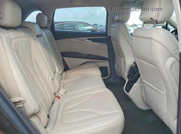 2LMPJ8KP9LBL13099 2020 LINCOLN NAUTILUS Brown Widok wnętrza z tyłu