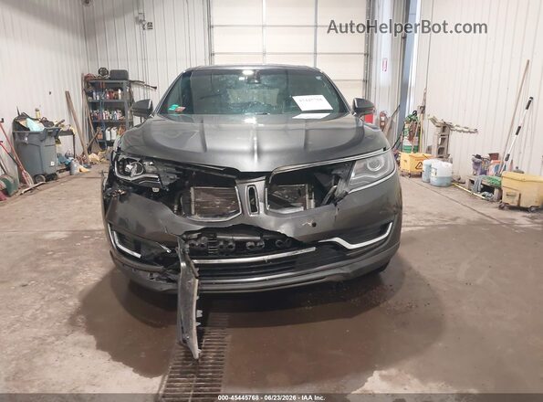 2LMPJ8LR9HBL20576 2017 LINCOLN MKX Gray ხელსაწყოთა პანელის ხედი