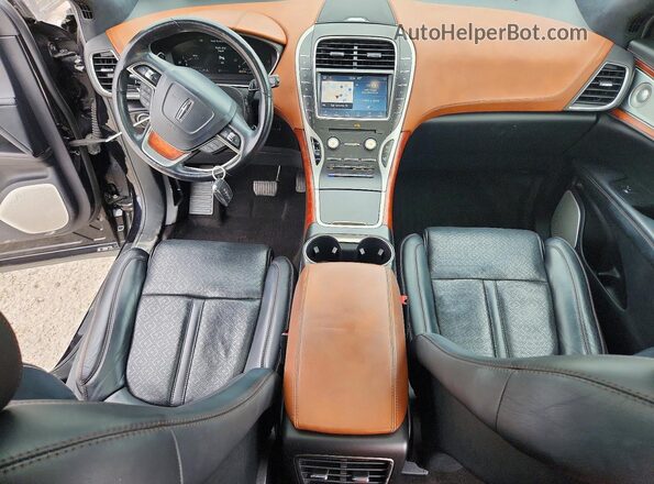 2LMPJ9JP2KBL41462 2019 LINCOLN NAUTILUS Черный Вид панели приборов