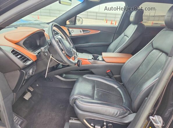 2LMPJ9JP2KBL41462 2019 LINCOLN NAUTILUS Черный Вид салона спереди