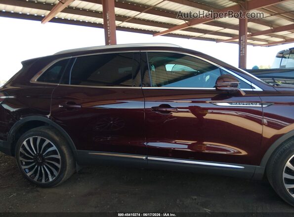 2LMPJ9JP3NBL23962 2022 LINCOLN NAUTILUS Maroon Rear interior view