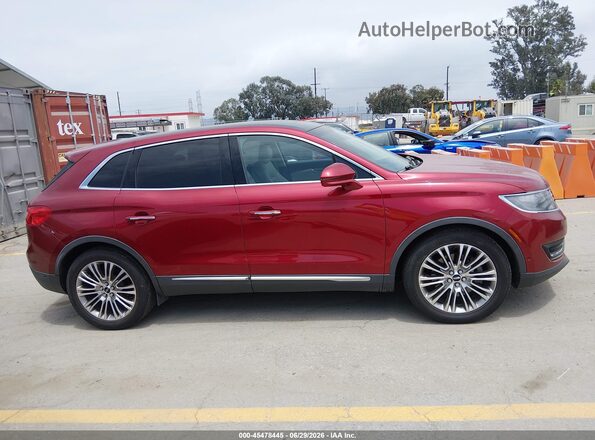 2LMTJ6LP9GBL57286 2016 LINCOLN MKX Red Vista interior trasera