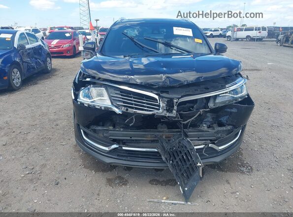 2LMTJ8LP1GBL62297 2016 LINCOLN MKX Black Vista interior trasera