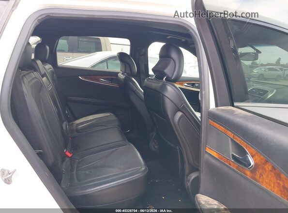 2LMTJ8LP7GBL45598 2016 LINCOLN MKX White VIN კოდის სტიკერის ხედი