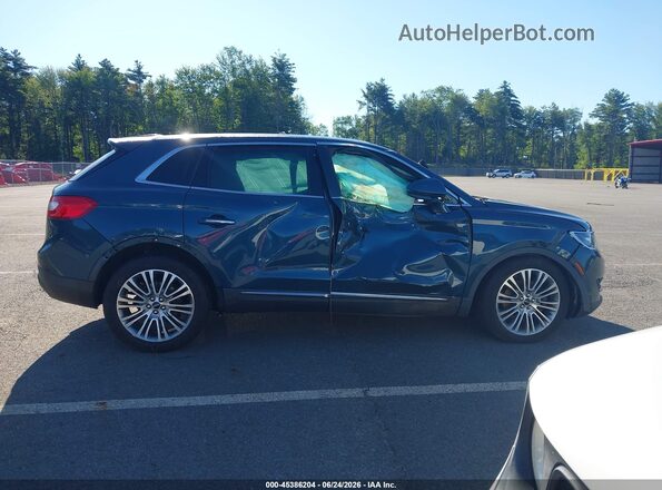 2LMTJ8LR3GBL69611 2016 LINCOLN MKX Синий Вид задней части салона