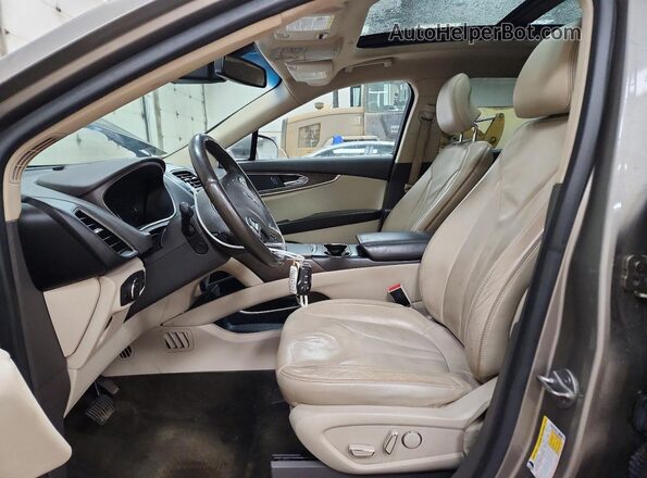 2LMTJ8LR4GBL54602 2016 LINCOLN MKX Желто-коричневый Вид салона спереди