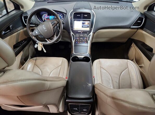 2LMTJ8LR4GBL54602 2016 LINCOLN MKX Желто-коричневый Вид панели приборов