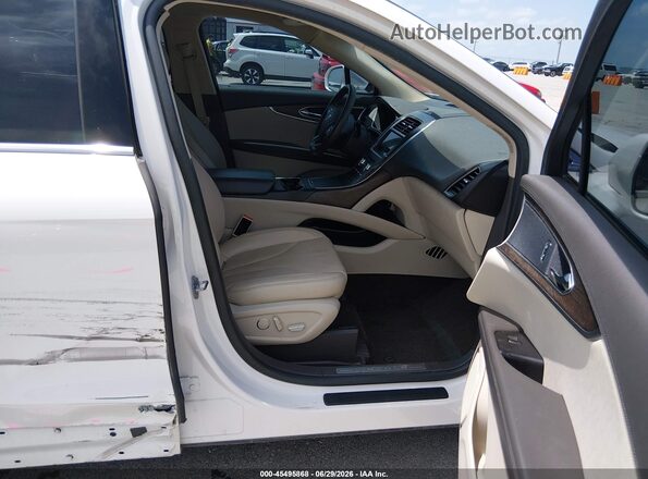 2LMTJ8LR4GBL62036 2016 LINCOLN MKX White Front interior view