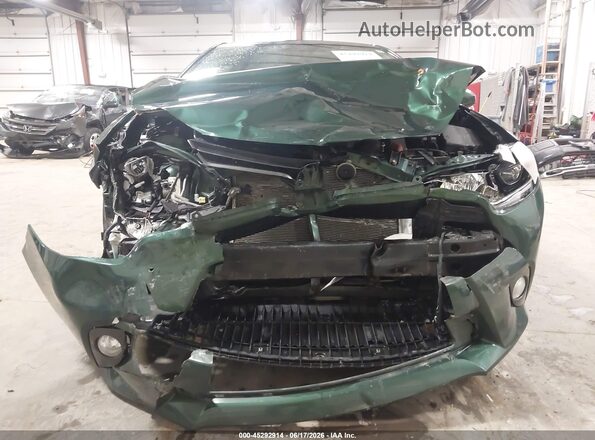 2T1BPRHE0GC598423 2016 TOYOTA COROLLA Green უკანა სალონის ხედი