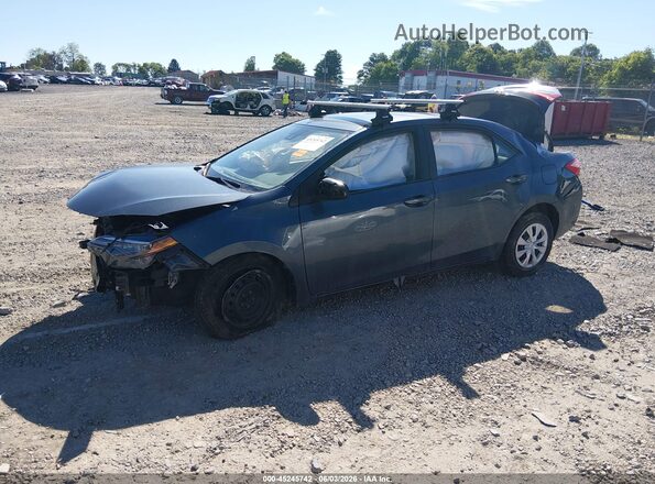 2T1BPRHE5HC956505 2017 TOYOTA COROLLA Gray Vista tres cuartos delantera izquierda