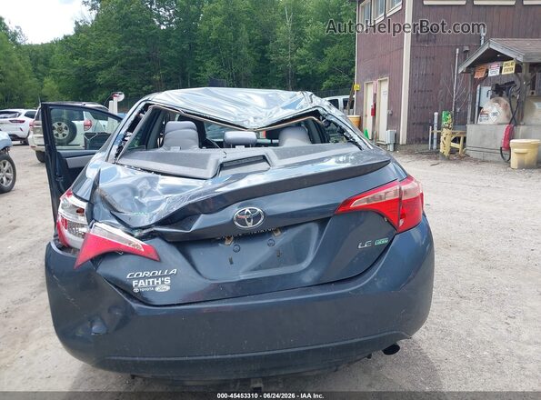 2T1BPRHE7JC094362 2018 TOYOTA COROLLA Blue Widok z przodu