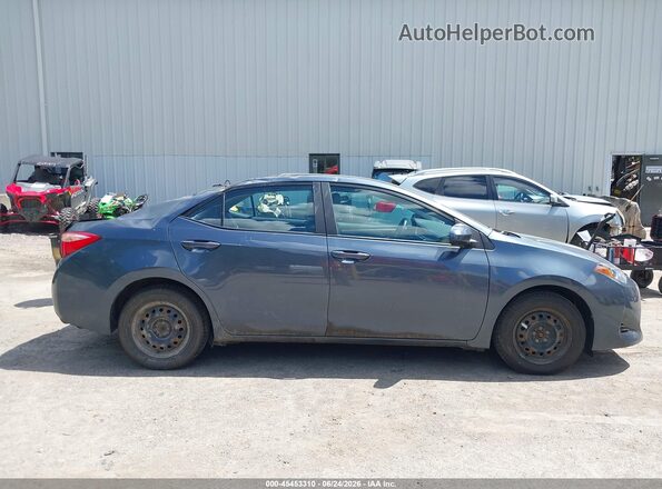 2T1BPRHE7JC094362 2018 TOYOTA COROLLA Blue Widok wnętrza z tyłu