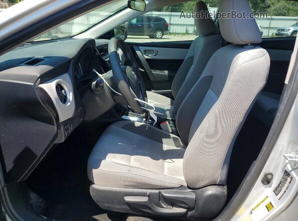 2T1BURHE0HC772162 2017 TOYOTA COROLLA Silver Front interior view