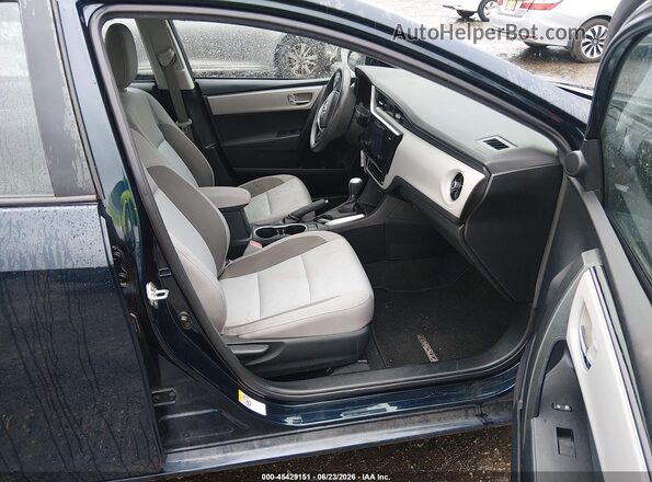 2T1BURHE0HC878658 2017 TOYOTA COROLLA Dark Blue Вид салону спереду