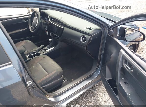 2T1BURHE0JC080683 2018 TOYOTA COROLLA Teal Front interior view