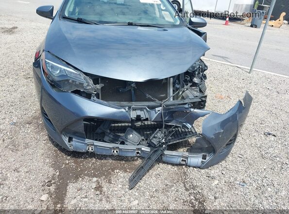 2T1BURHE0JC080683 2018 TOYOTA COROLLA Teal Front view