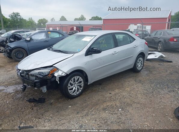 2T1BURHE0KC181157 2019 TOYOTA COROLLA Silver წინა მარცხენა ხედი სამი მეოთხედიდან