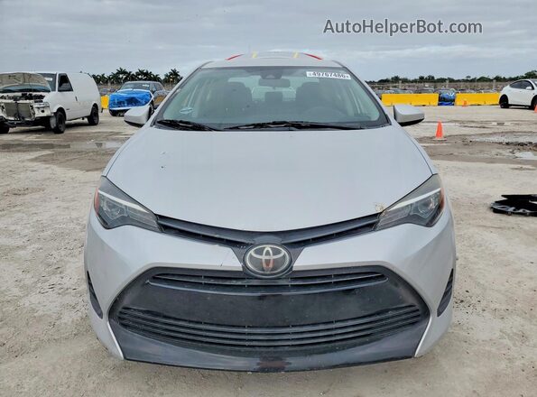 2T1BURHE0KC222953 2019 TOYOTA COROLLA Silver Вид спереду