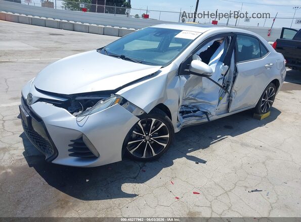 2T1BURHE0KC229420 2019 TOYOTA COROLLA Silver Front left