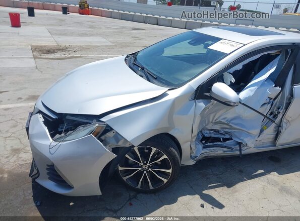 2T1BURHE0KC229420 2019 TOYOTA COROLLA Silver Front view