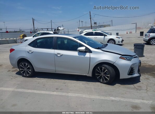 2T1BURHE0KC229420 2019 TOYOTA COROLLA Silver Rear interior view
