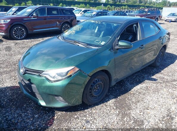 2T1BURHE1GC650229 2016 TOYOTA COROLLA Green Vista tres cuartos delantera izquierda