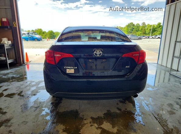 2T1BURHE1HC793568 2017 TOYOTA COROLLA Black Widok z tyłu