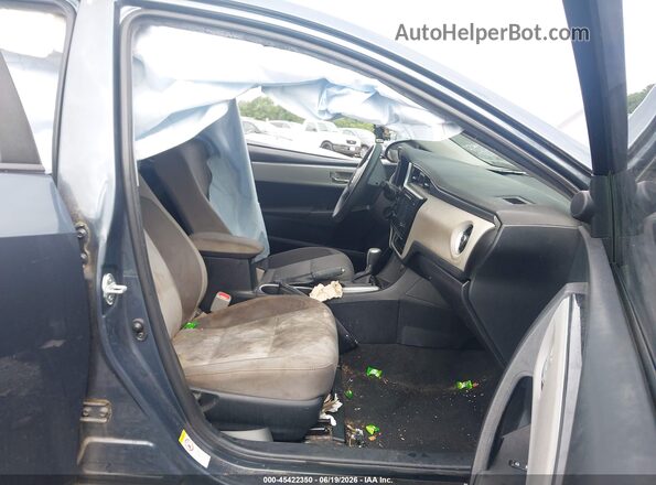 2T1BURHE1HC864087 2017 TOYOTA COROLLA Gray Vista interior delantera