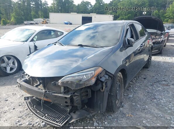 2T1BURHE1HC864087 2017 TOYOTA COROLLA Gray Vista tres cuartos delantera izquierda