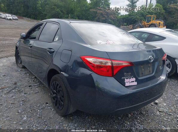 2T1BURHE1HC864087 2017 TOYOTA COROLLA Gray Trasero izquierdo