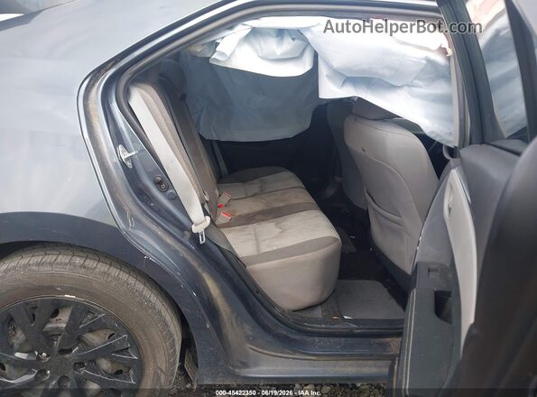 2T1BURHE1HC864087 2017 TOYOTA COROLLA Gray Vista de la etiqueta del VIN