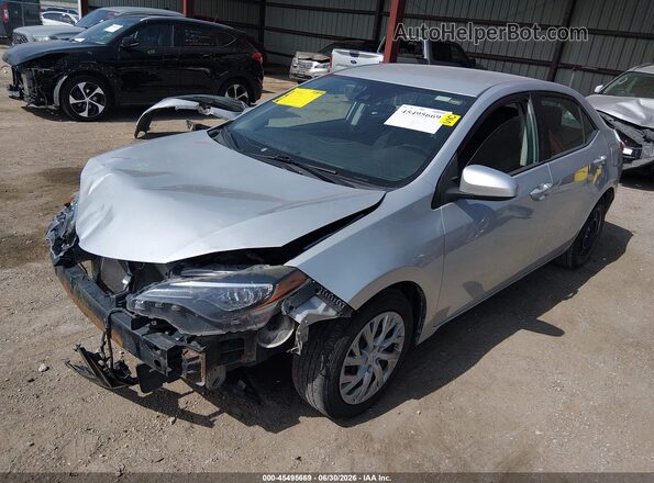 2T1BURHE1HC895159 2017 TOYOTA COROLLA Silver Vista tres cuartos delantera izquierda
