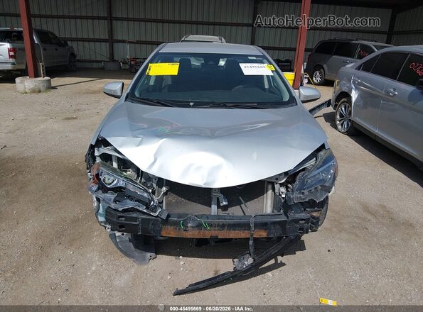 2T1BURHE1HC895159 2017 TOYOTA COROLLA Silver Vista interior trasera