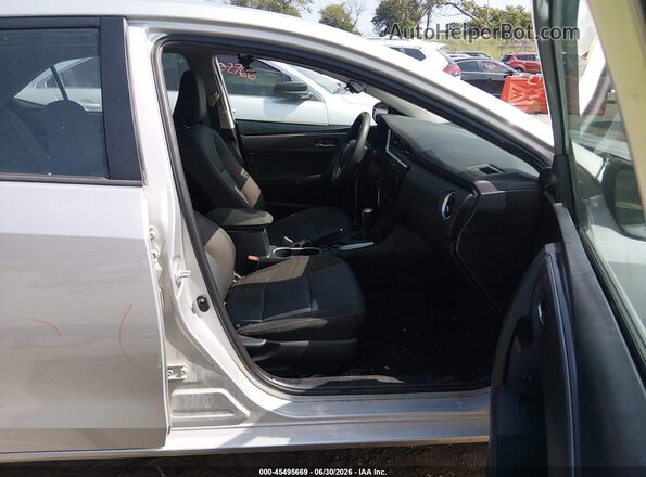 2T1BURHE1HC895159 2017 TOYOTA COROLLA Silver Vista interior delantera