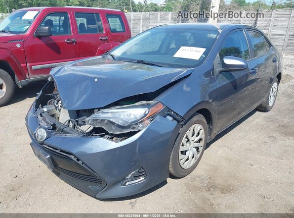 2T1BURHE1HC896229 2017 TOYOTA COROLLA Gray Vista tres cuartos delantera izquierda