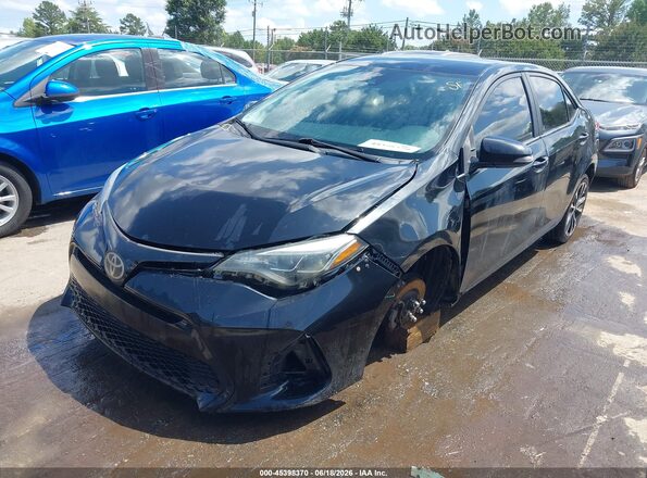 2T1BURHE1HC905091 2017 TOYOTA COROLLA Black Vista tres cuartos delantera izquierda