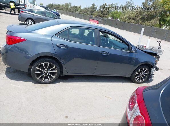 2T1BURHE1JC037762 2018 TOYOTA COROLLA Blue Սալոնի հետևի տեսք