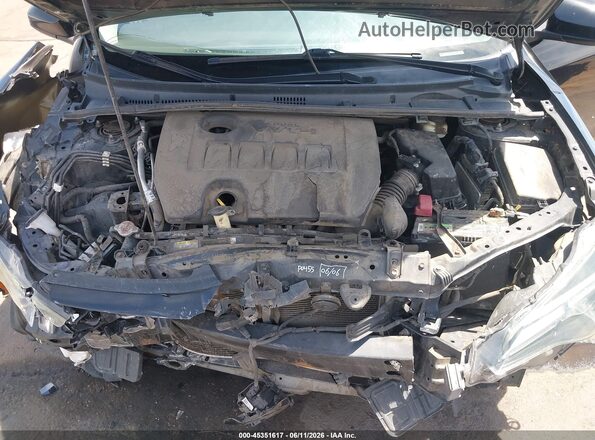 2T1BURHE1JC985062 2018 TOYOTA COROLLA Black Vista trasera