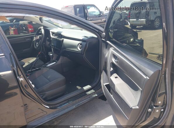 2T1BURHE1JC985062 2018 TOYOTA COROLLA Black Vista interior delantera