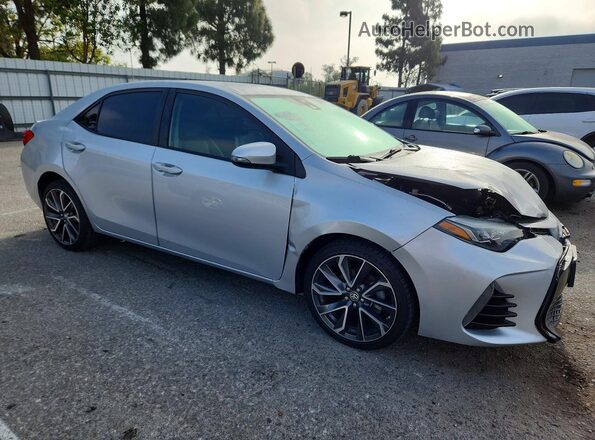 2T1BURHE1JC996790 2018 TOYOTA COROLLA Серебряный 