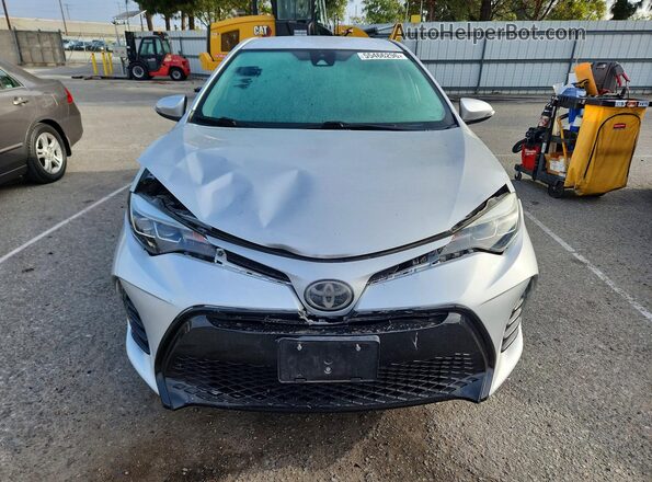 2T1BURHE1JC996790 2018 TOYOTA COROLLA Серебряный 
