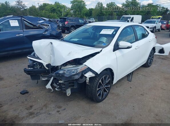 2T1BURHE1KC136549 2019 TOYOTA COROLLA White Vista tres cuartos delantera izquierda