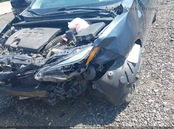 2T1BURHE1KC163752 2019 TOYOTA COROLLA Gray Widok z przodu