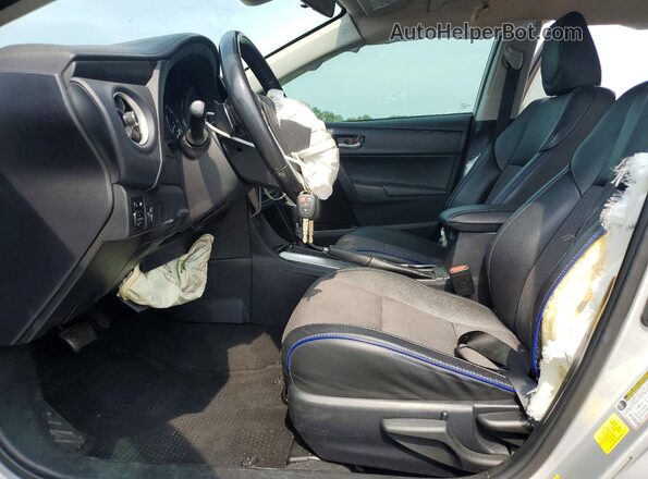 2T1BURHE2HC802777 2017 TOYOTA COROLLA Silver Vista interior delantera