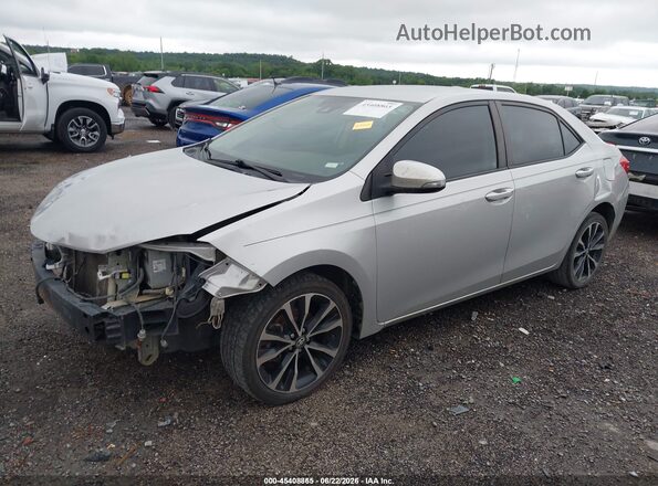 2T1BURHE2HC924166 2017 TOYOTA COROLLA Silver Vista tres cuartos delantera izquierda